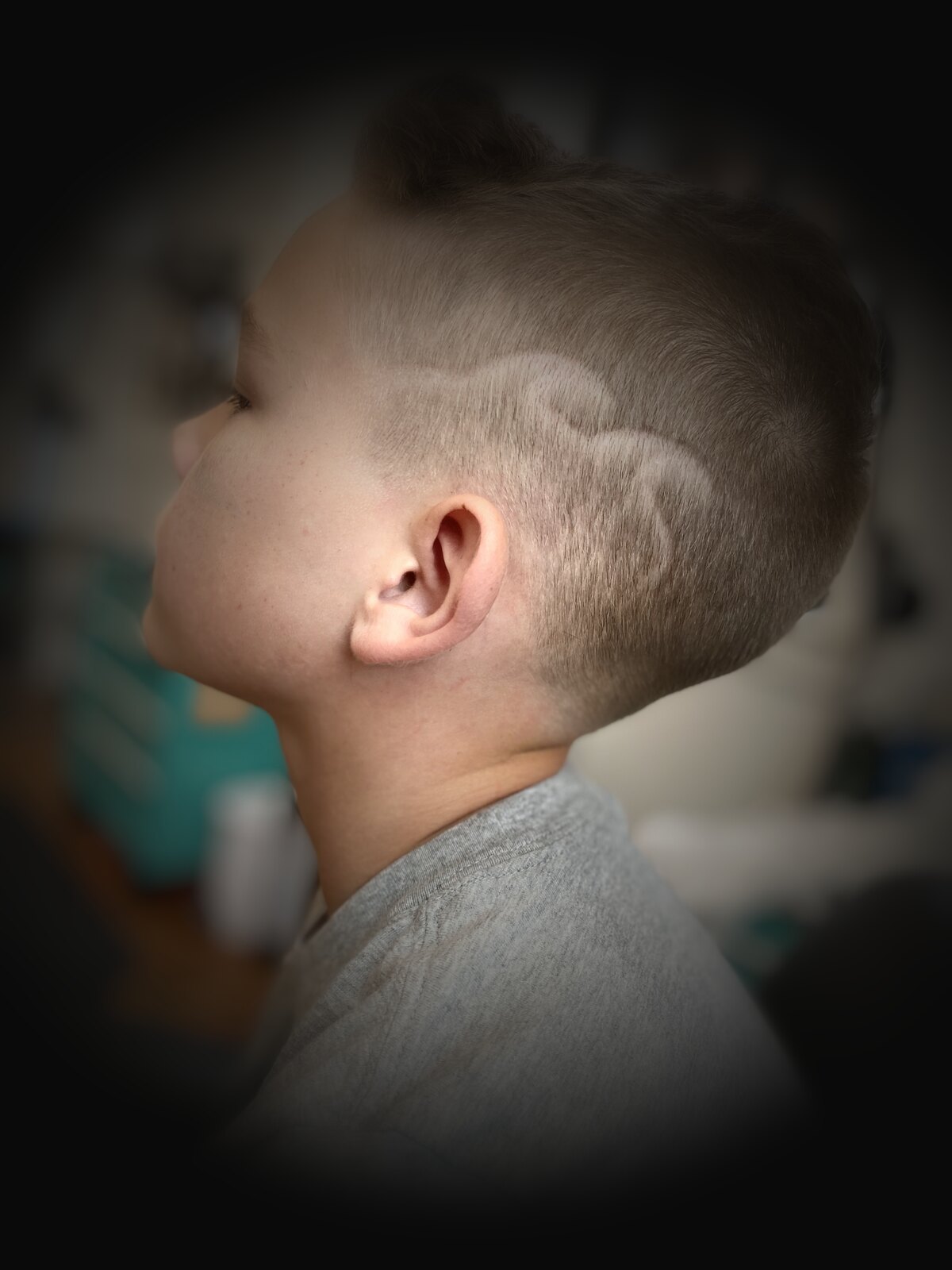 Kids' mohawk with a hair-art design