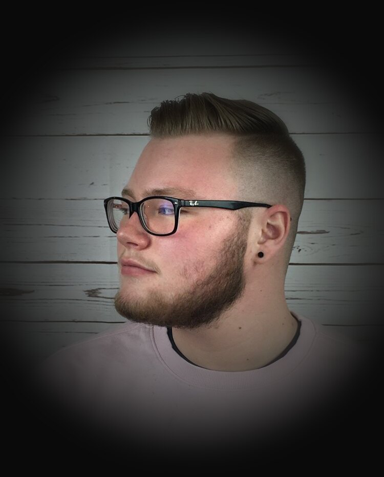 Slicked-back undercut with beard